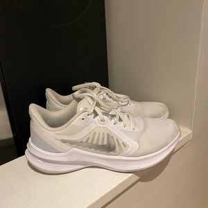White Nike women running shoes